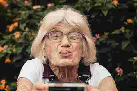 Older lady taking a selfie